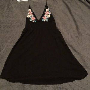 Black dress with floral detail on top